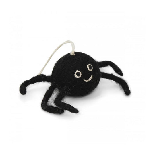 Black spider-shaped felt decoration with a white background