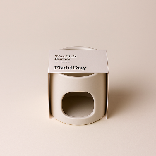 Stoneware Wax melt burner with 'FieldDay' branding on a beige background