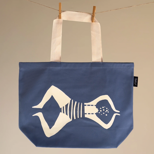 Blue tote bag with a white graphic of a person swimming on a blue background