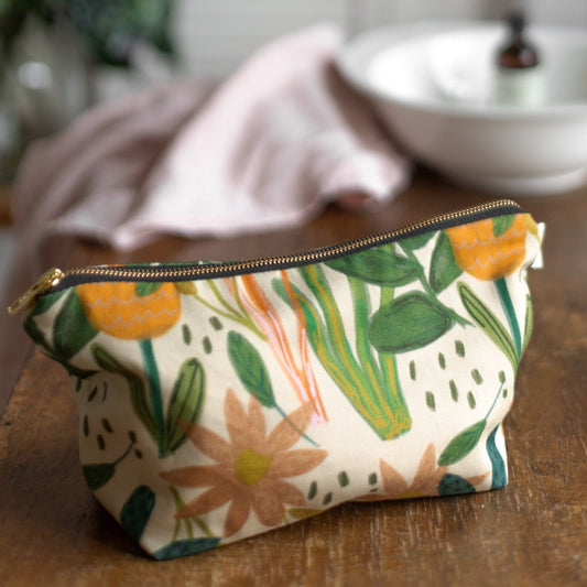 A floral wash bag Printed on sustainable cotton, with a high quality YKK brass zip and natural panama cotton lining.