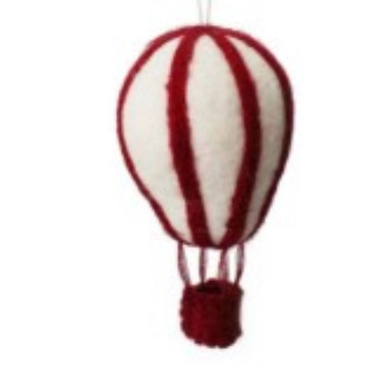 Red and white striped hot air balloon ornament on a white background