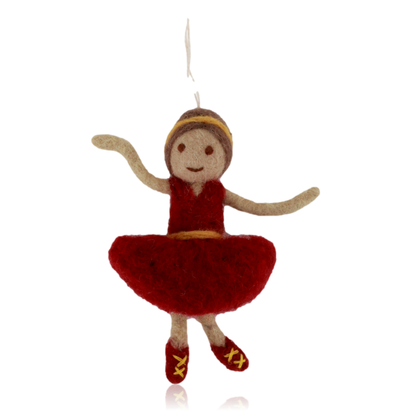 Felted ornament of a dancer in a red dress on a white background