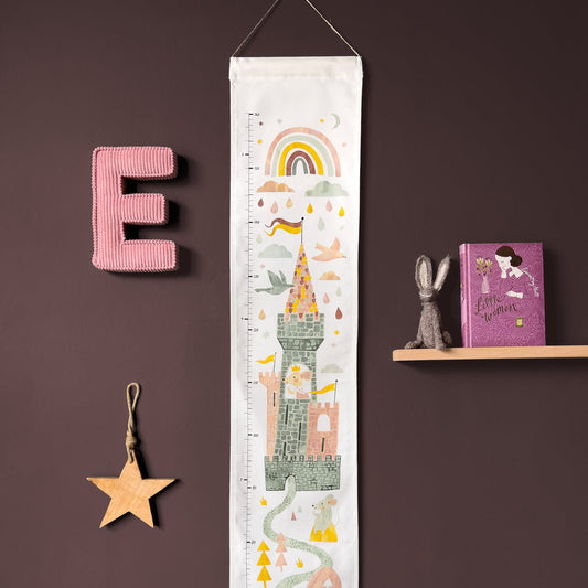 Decorative growth chart with castle design on.