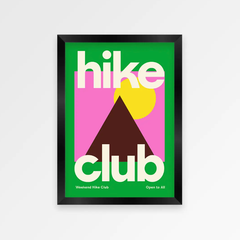 Framed poster with 'hike club' text and colorful design on a green background