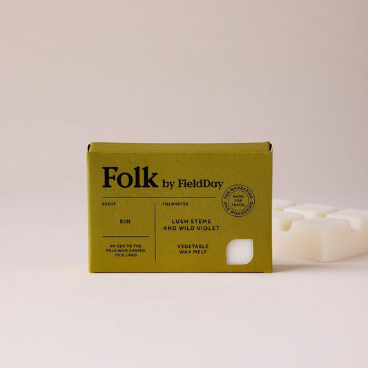 Green packaging with 'Folk by Field Day' branding on a beige background vegetable wax melt