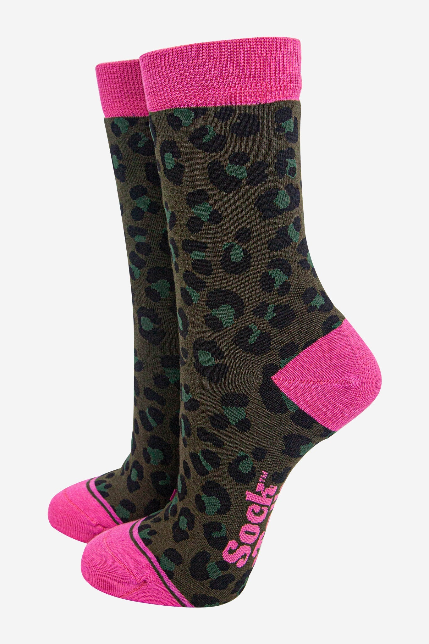 socks with leopard print and pink accents on a white background