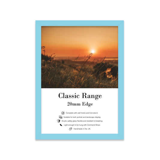 Framed artwork with a sunset over a field and 'Classic Range' text on a white background.
