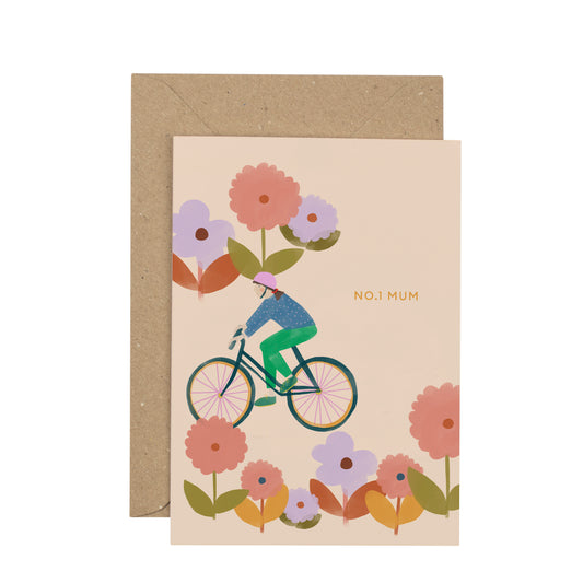 Greeting card with a cyclist and flowers design on a beige background