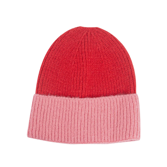 pink and red knitted beanie hat, two tone coloured hat on a white background