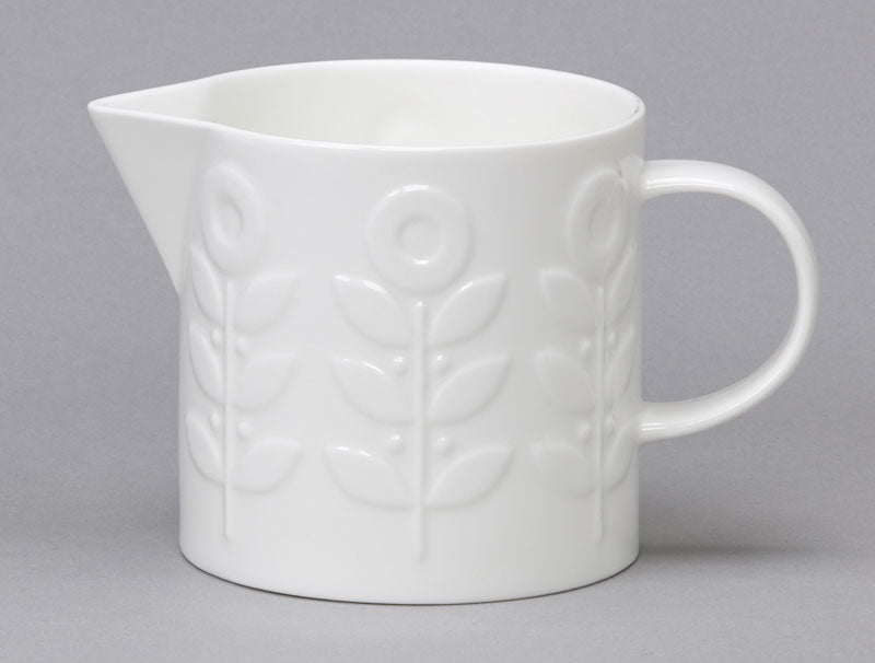 White bone china pitcher with laurel design repeat repeat