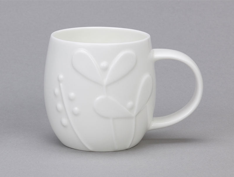 White bone china mug with 3d seedling design