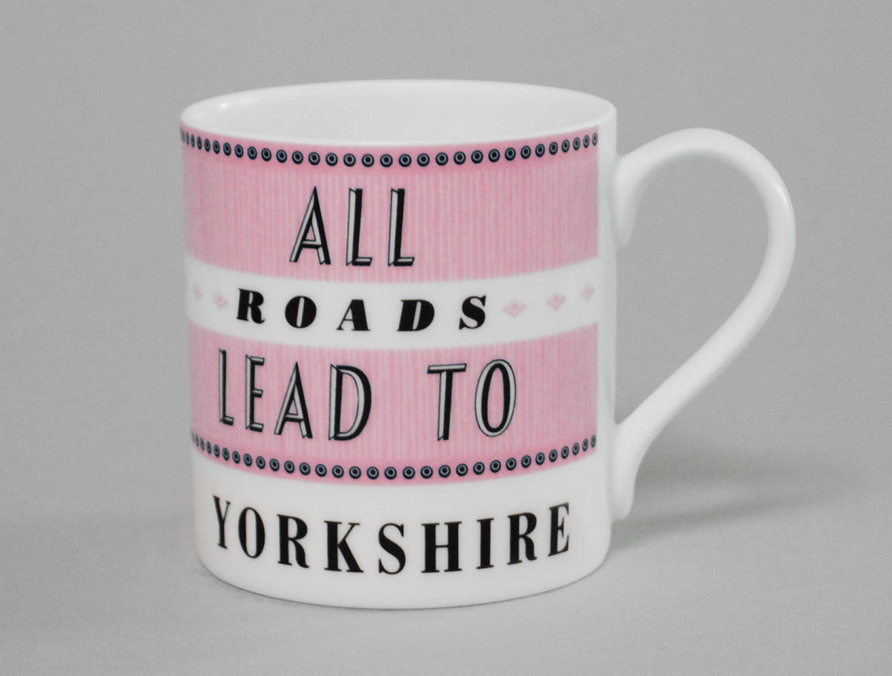 white and pink bone china mug all roads lead to yorkshire