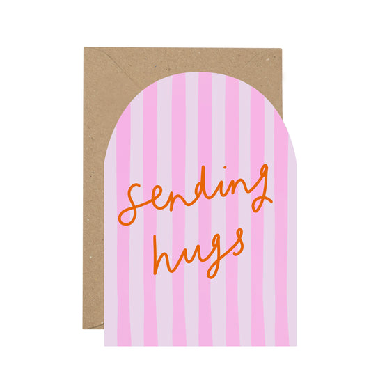 Card with pink and white striped design and 'Sending hugs' text on a white background