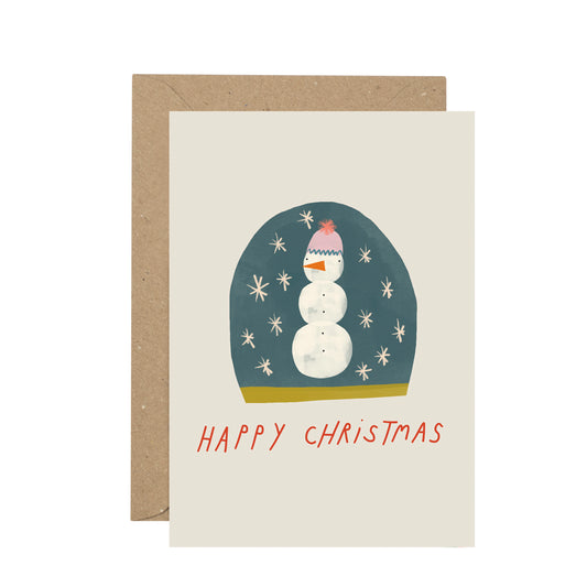 Christmas card with a snowman illustration and 'Happy Christmas' text, featuring a brown envelope.