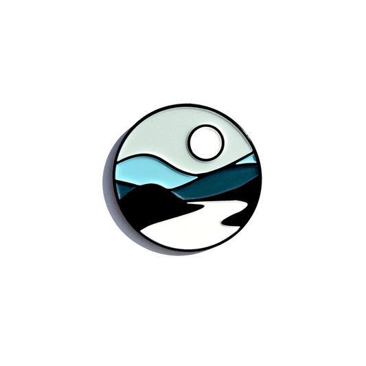 Circular illustration with a stylised landscape featuring water, sky, and land.