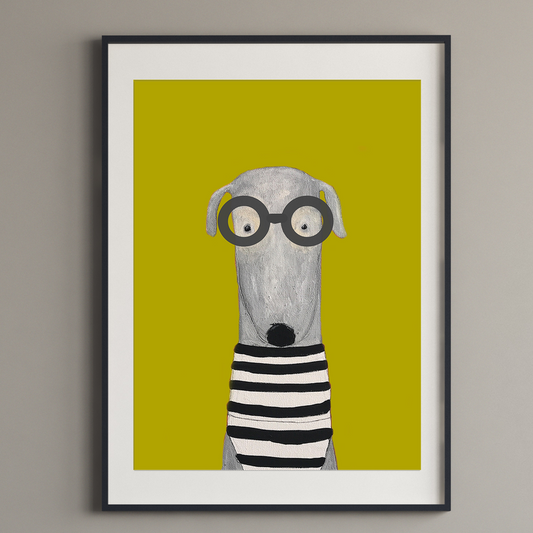 Framed artwork of a dog with glasses and a striped shirt on a mustard background, displayed in a living room.