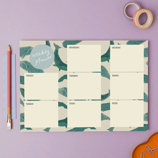 Weekly planner with a whale pattern, displaying a weekly spread  for each day of the week, Made from bleed proof, eco-friendly, recycled paper with 100gsm pages in Britain.