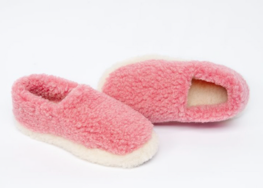 A pair of pink YOKO wool slippers with a two-tone colorway and an anti-slip sole.