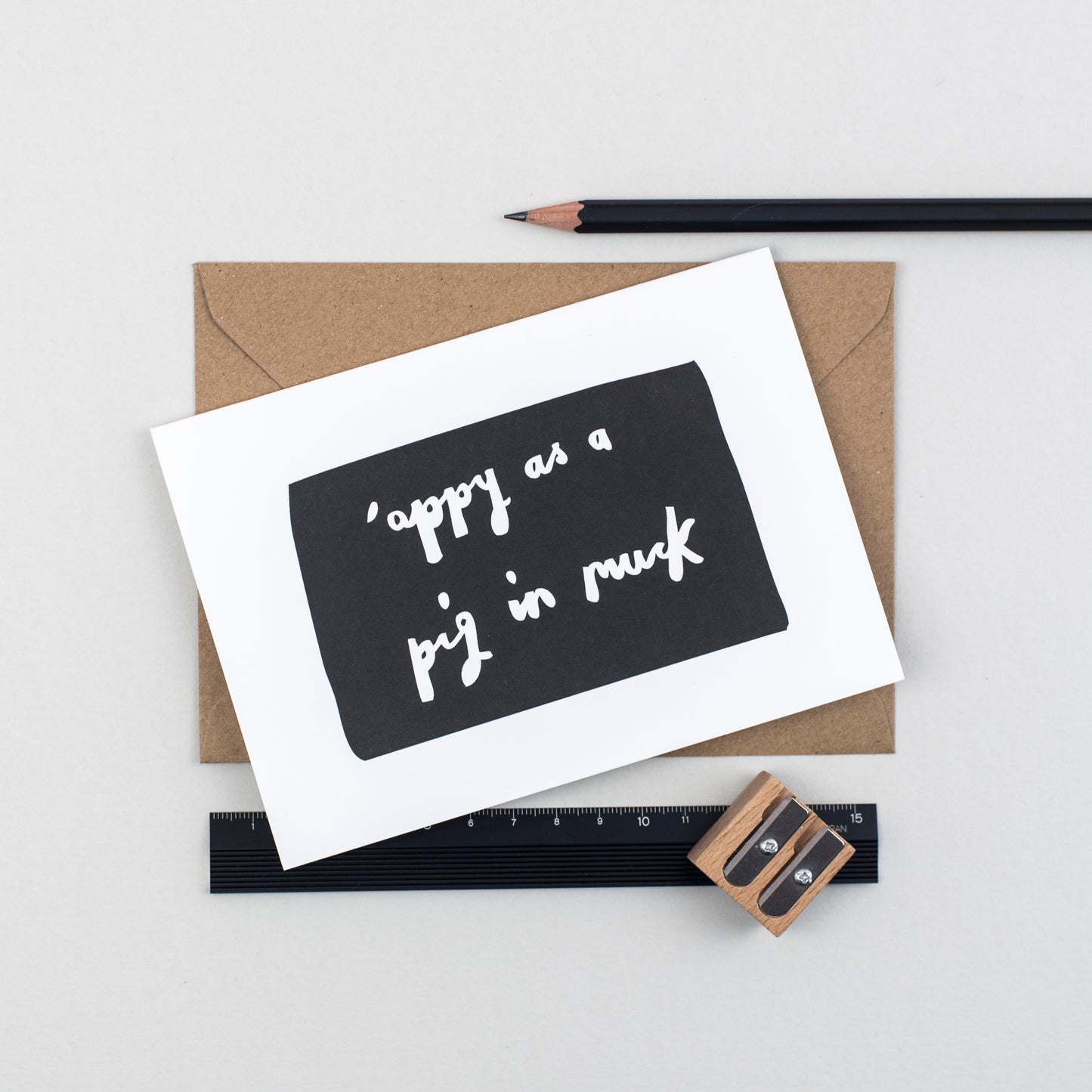 pig-in-muck-greetings-card