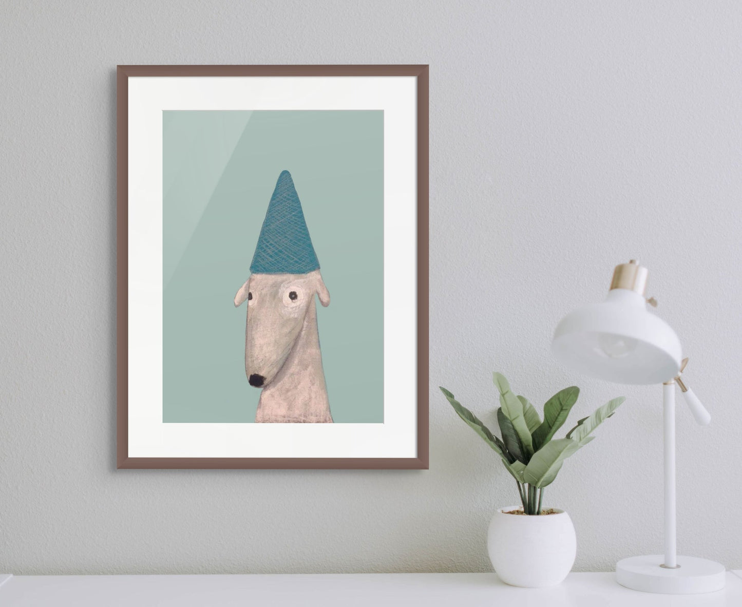 print of dog wearing a party hat.