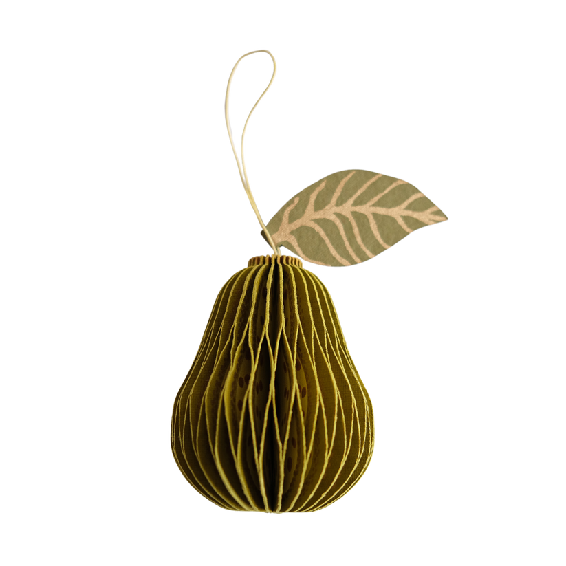 Decorative paper pear ornament with a leaf on a white background