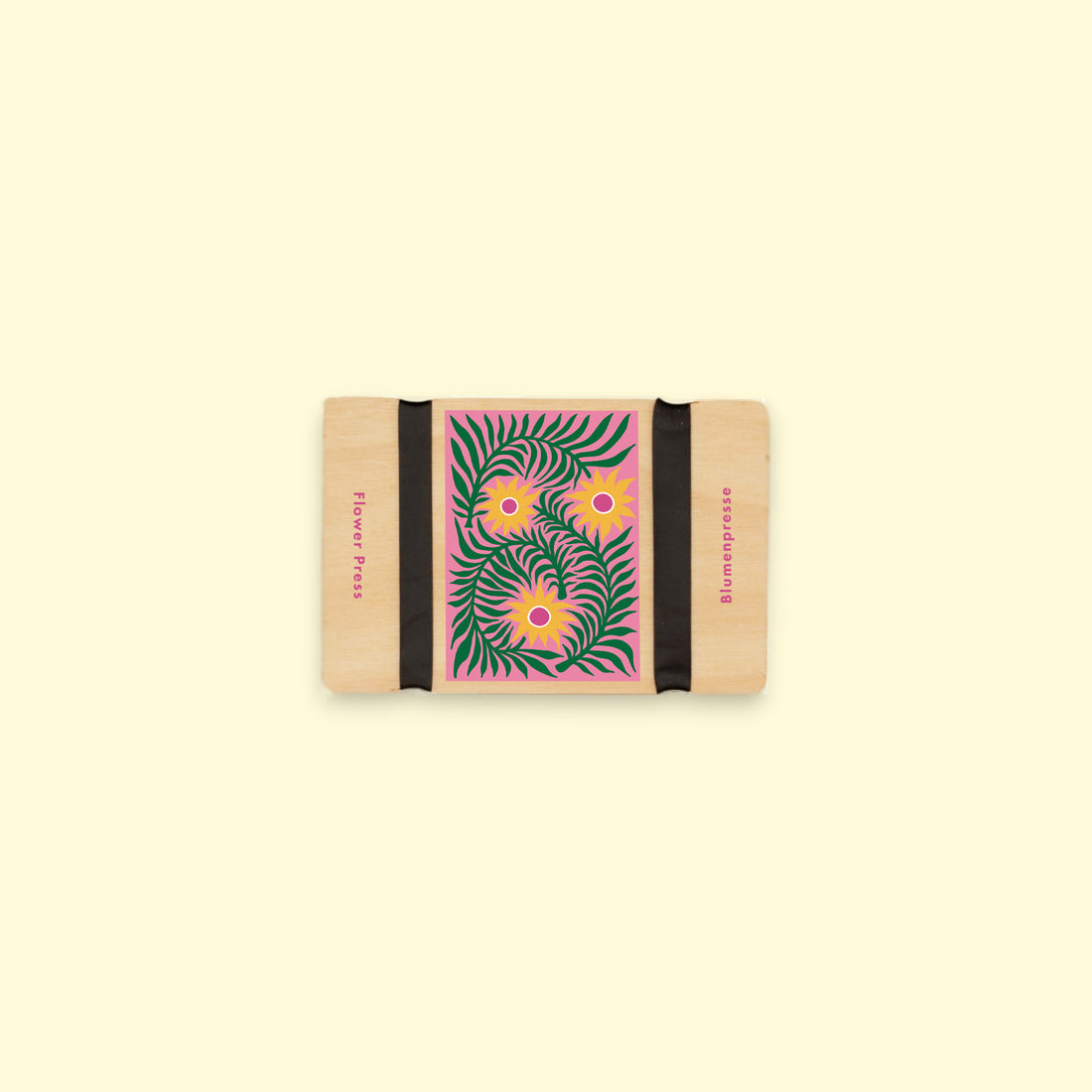 Rectangular Mini flower press with floral design on a beige background