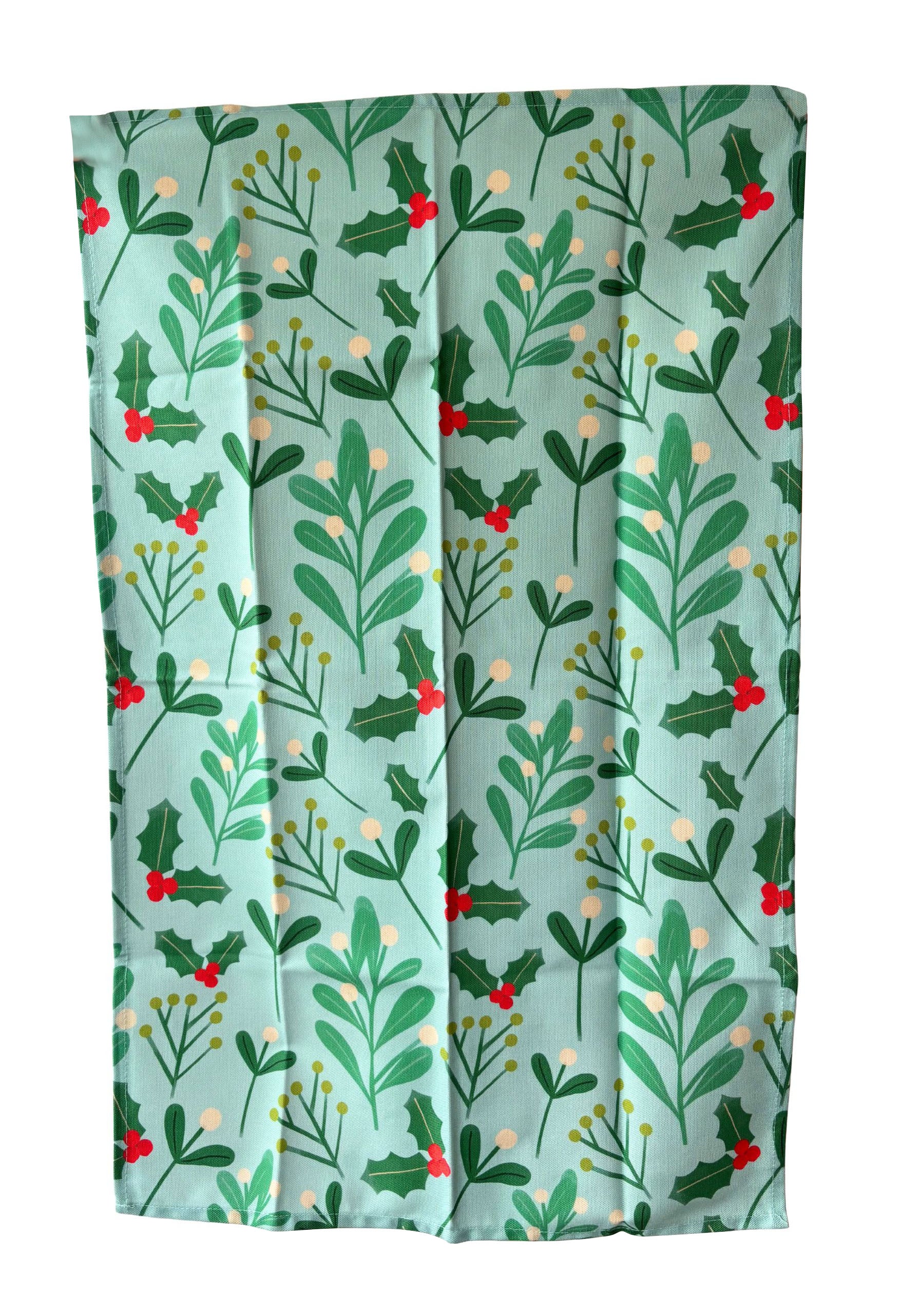 Festive fabric with holly leaf and berry pattern on a light blue background