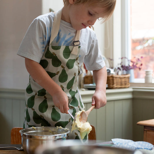 Kids apron with pear design, adjustable neck strap. 100% cotton. Made in Britain 