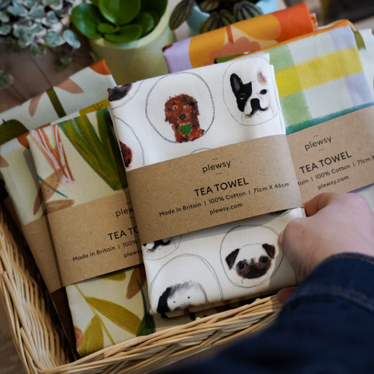 dog tea towel folded in a basket