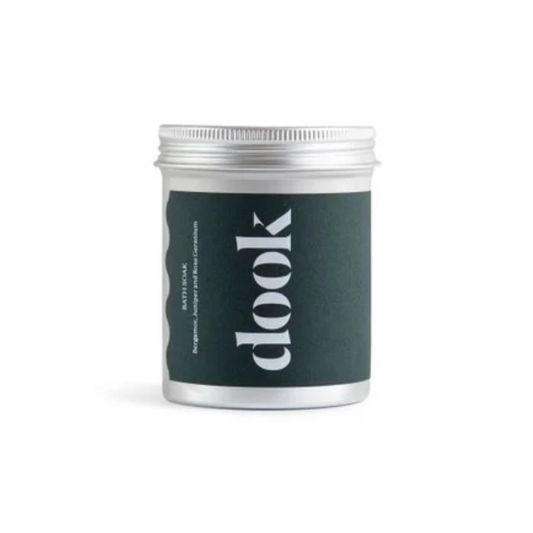 Jar of dook bath salts on a white background