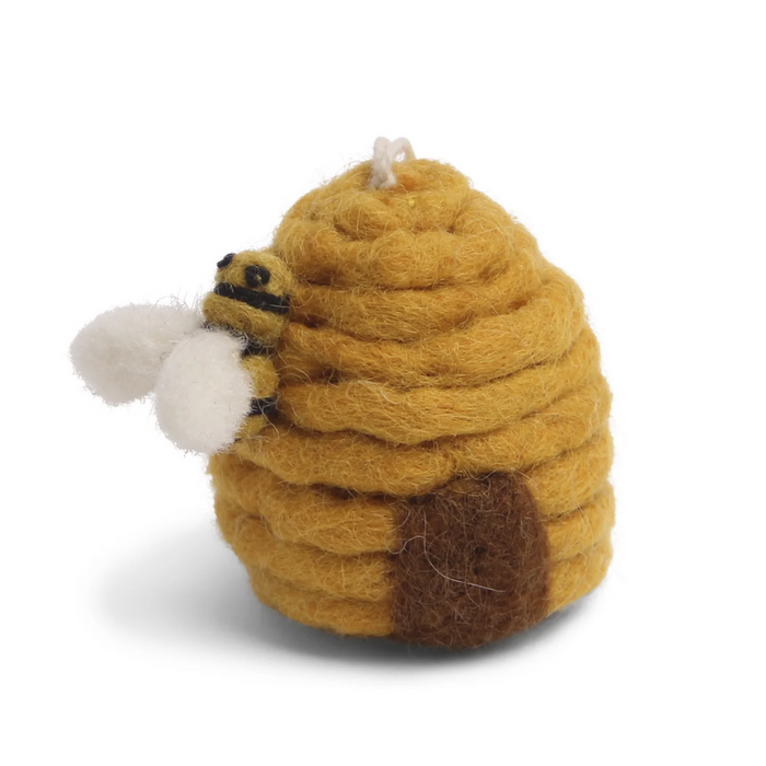 Handmade felt bee hive with bee attached