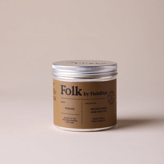 Jar of Folk by Field Day pomade on a beige background