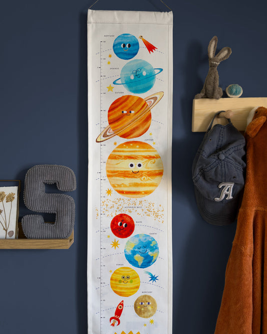 Fabric childrens growth chart with solar system design in bright colours