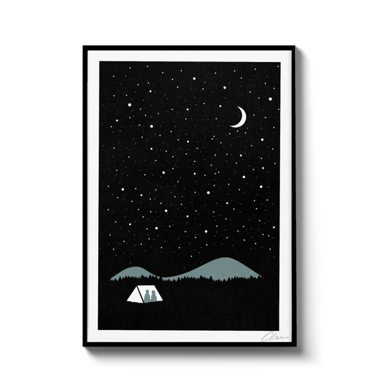 Framed artwork of a night sky with stars, moon, mountains, and a tent.