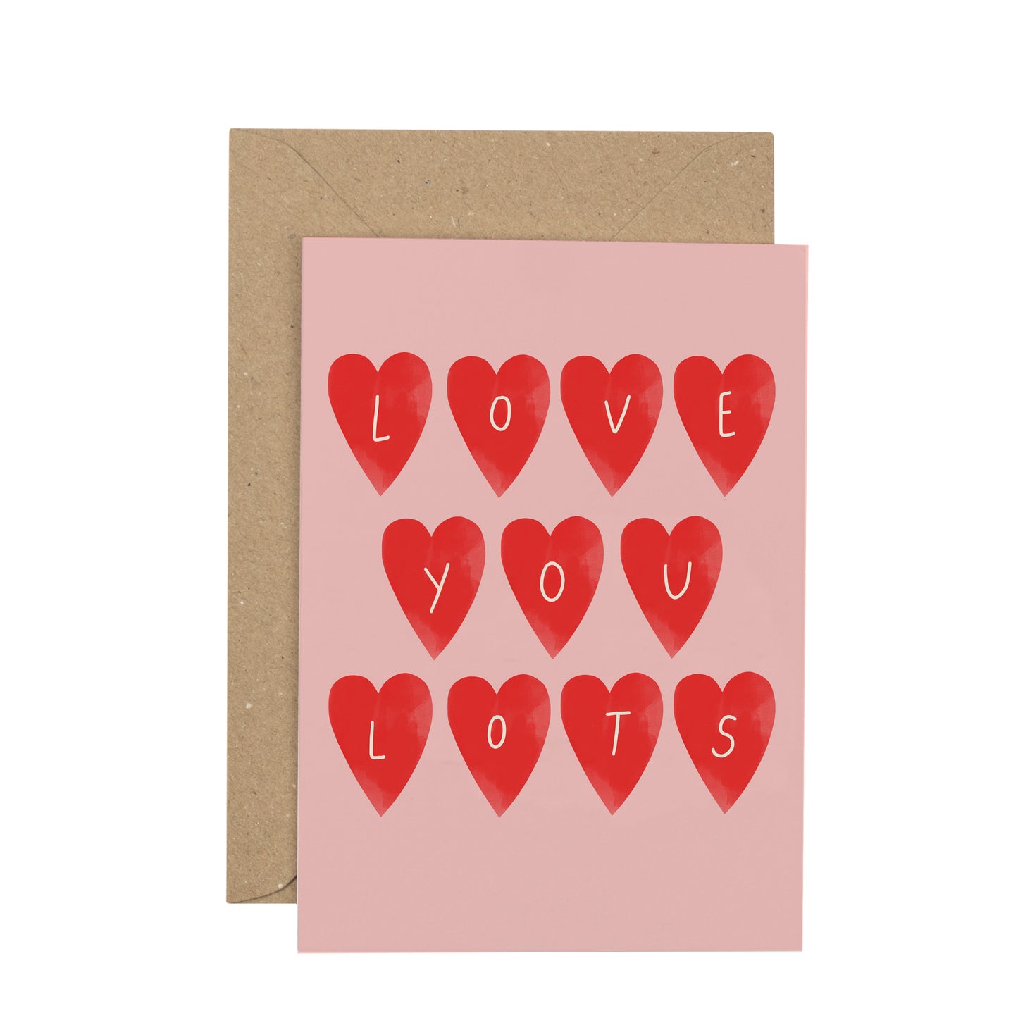 Greeting card with red hearts spelling 'I LOVE YOU LOTS' on a pink background, with a brown envelope.