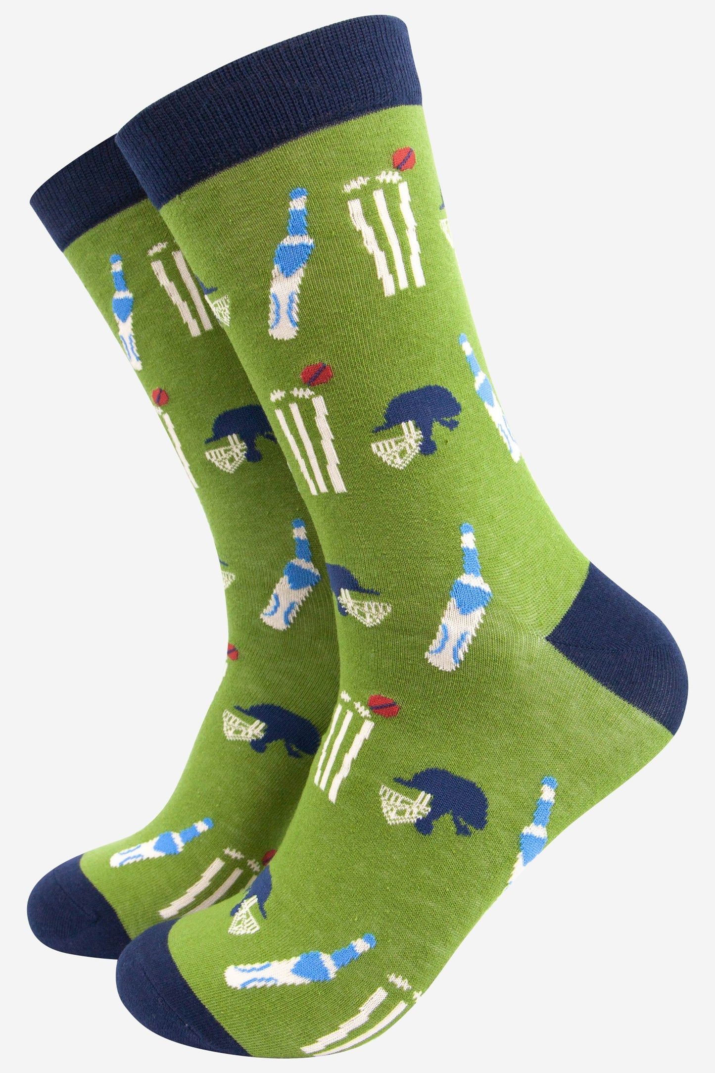 Green socks with cricket-themed design on a white background