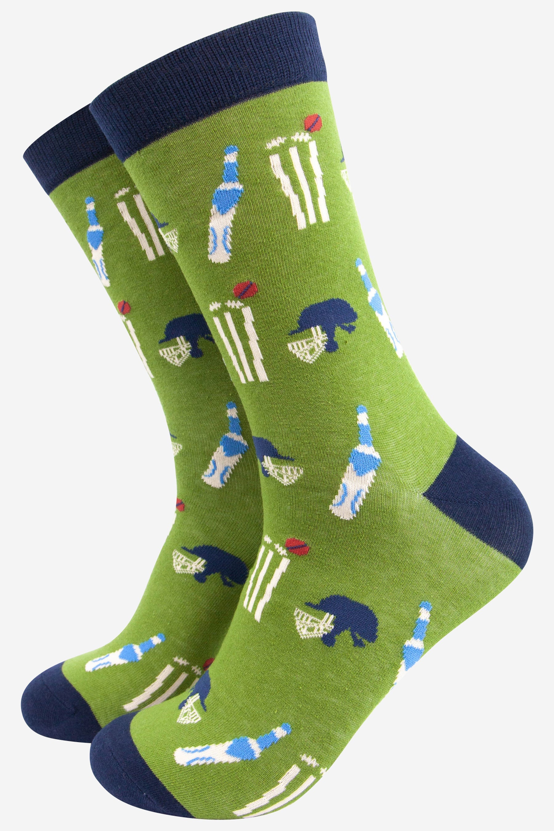 Green socks with cricket-themed design on a white background