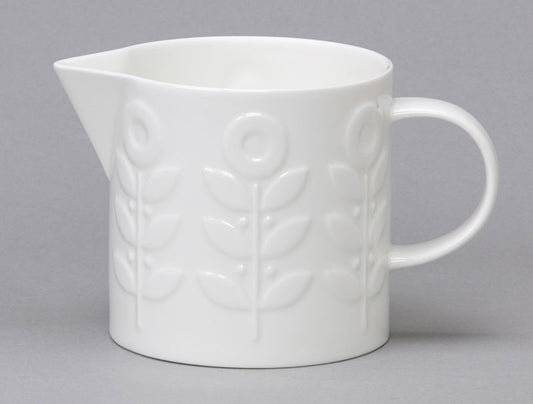 White bone china pitcher with laurel design repeat repeat