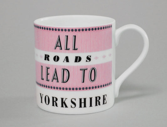 white and pink bone china mug all roads lead to yorkshire