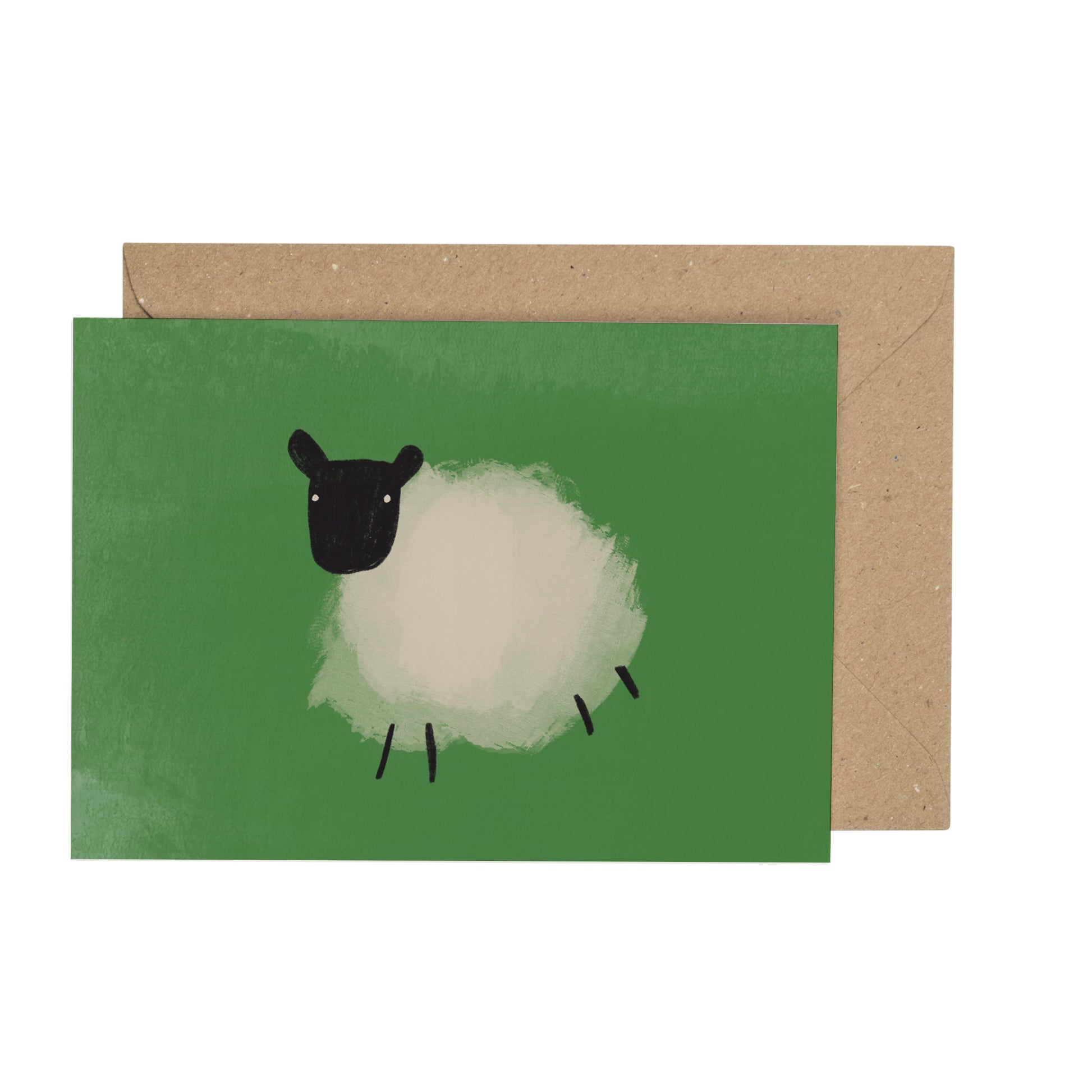 Card with a sheep illustration on a green background and brown envelope