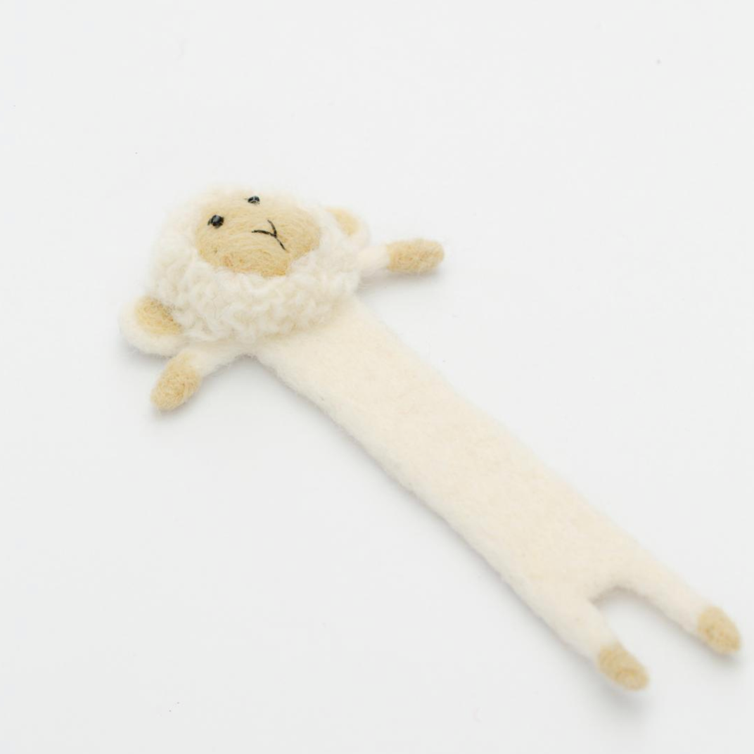 Plush toy lamb bookmark on a white background