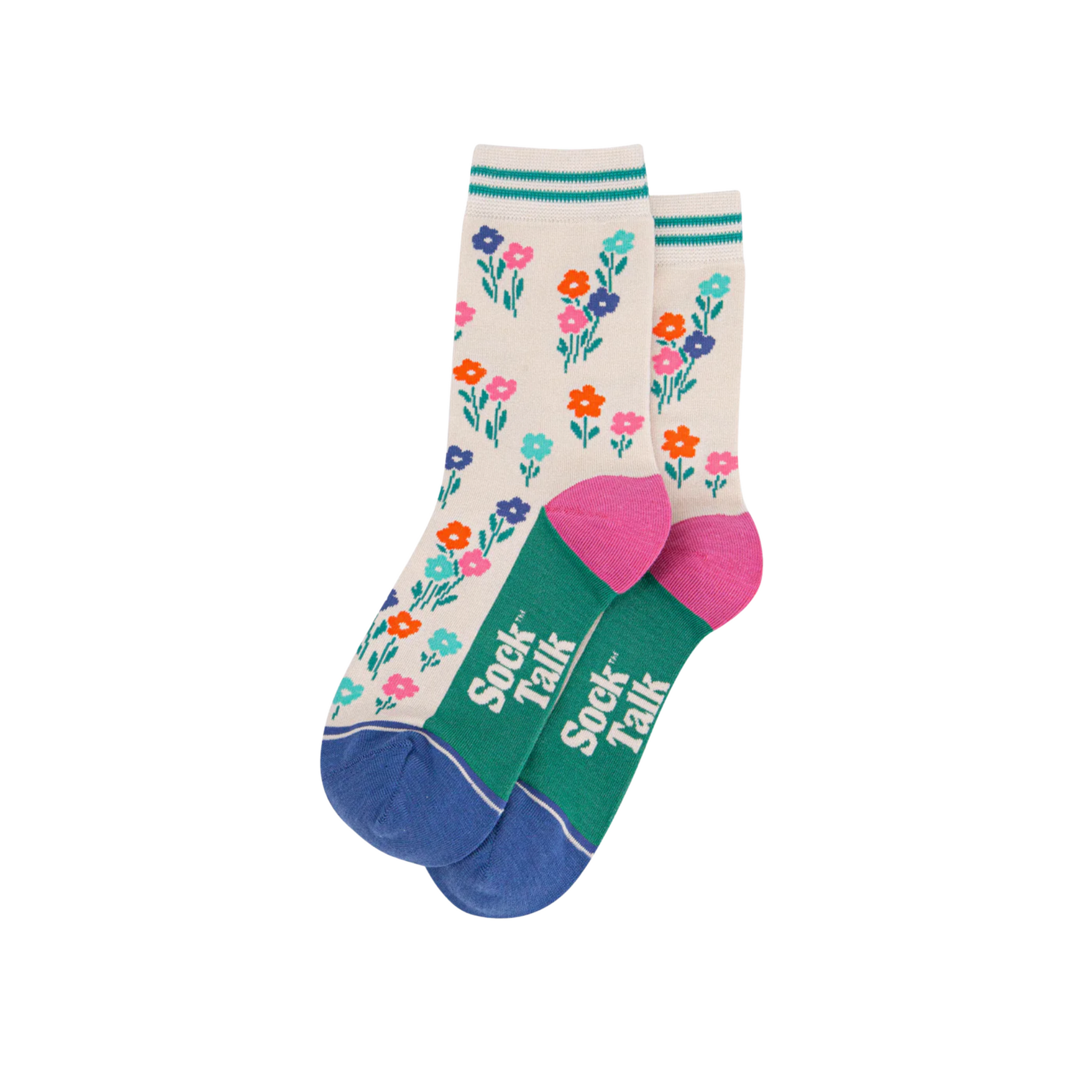 Pair of socks with floral design and text on a white background