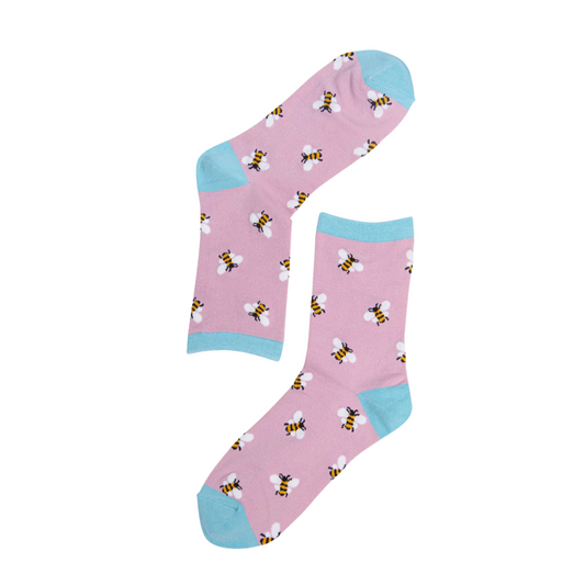 Pink socks with bee pattern and blue accents on a white background