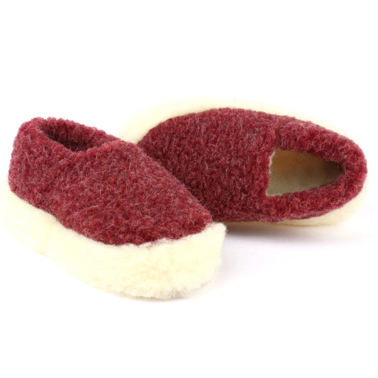 Pair of dark red slippers with white soles on a white background
