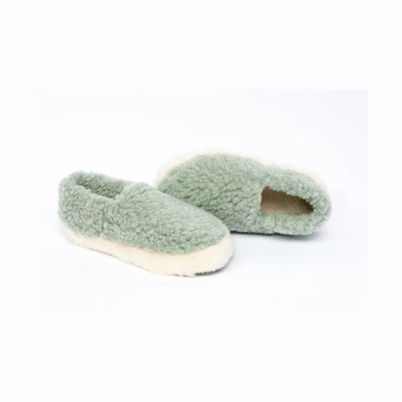 Pair of green s100% wool lippers on a white background