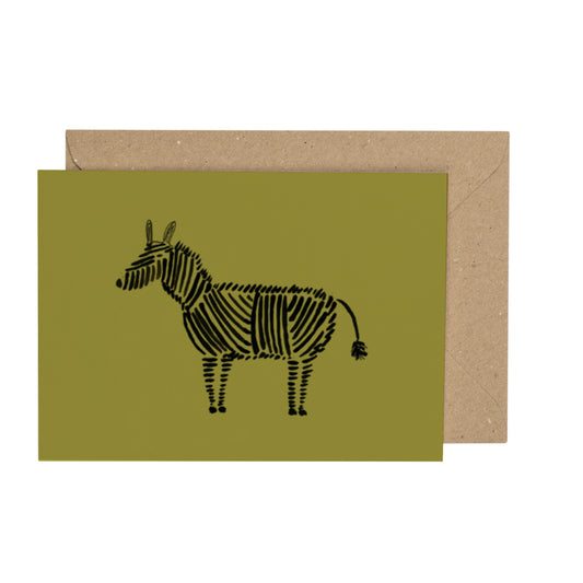 Greeting card with a zebra illustration on a green background, accompanied by a brown envelope.