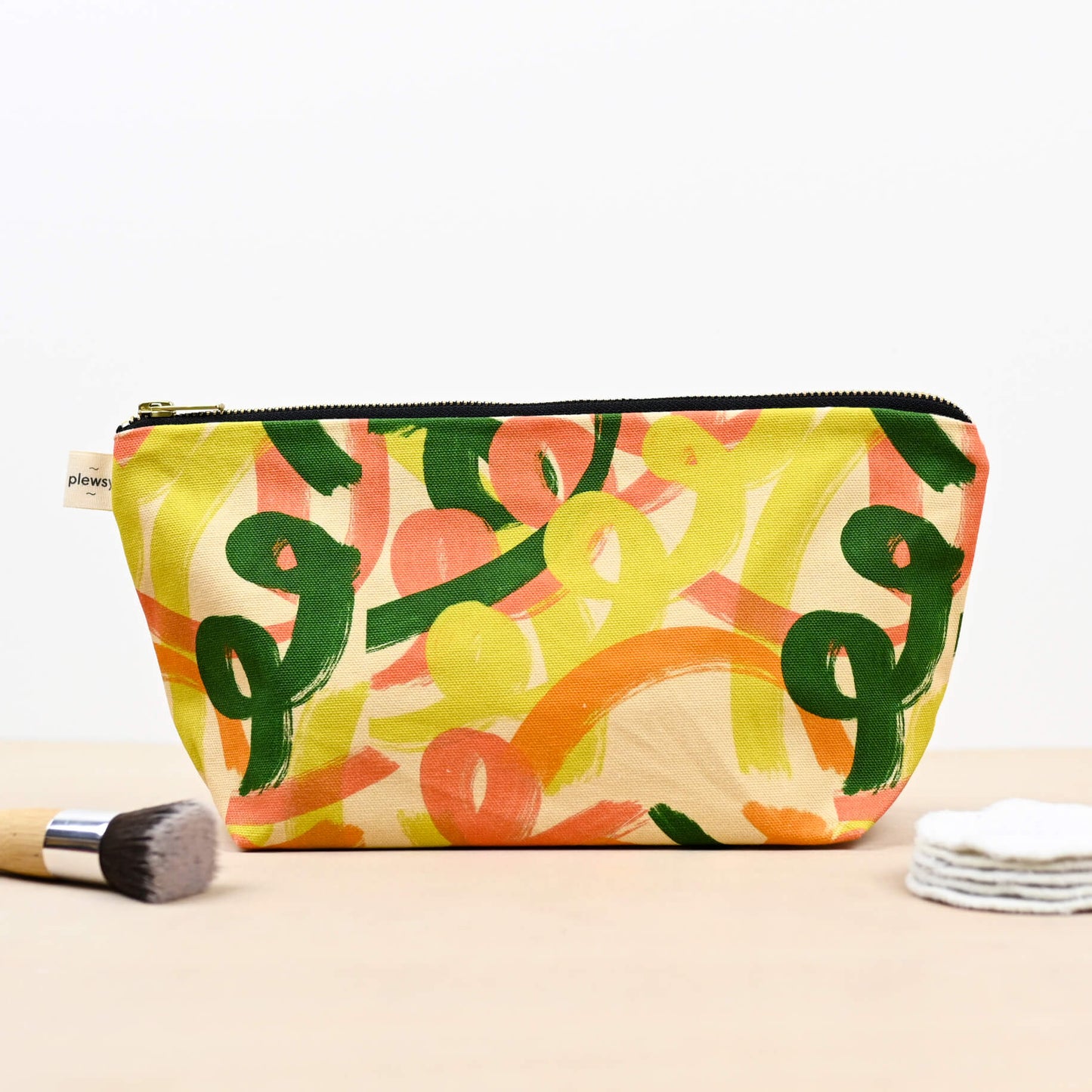 Cosmetic bag  colourful squiggle design Printed on sustainable cotton, with a high quality YKK brass zip and natural panama cotton lining.