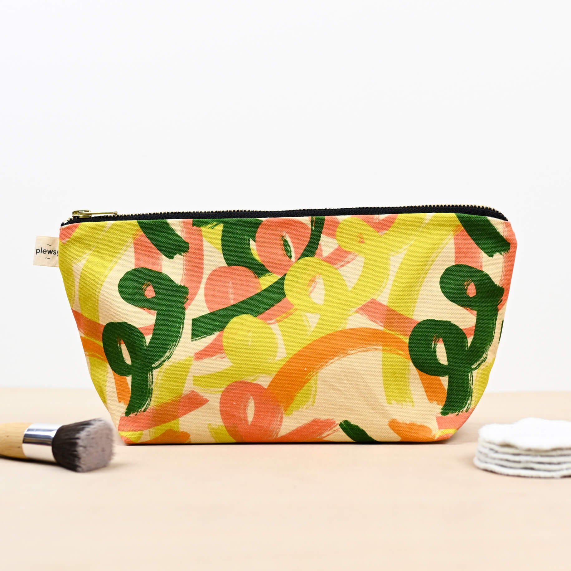 Cosmetic bag  colourful squiggle design Printed on sustainable cotton, with a high quality YKK brass zip and natural panama cotton lining.